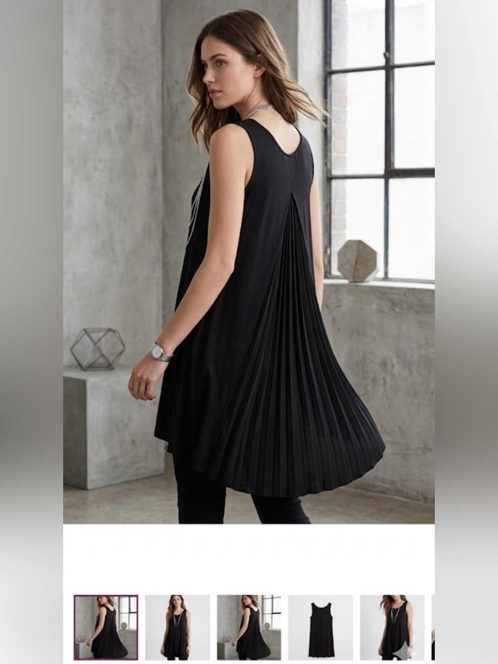 This is a black Kensie brand tank dress Chiffon pleats at the back size XL